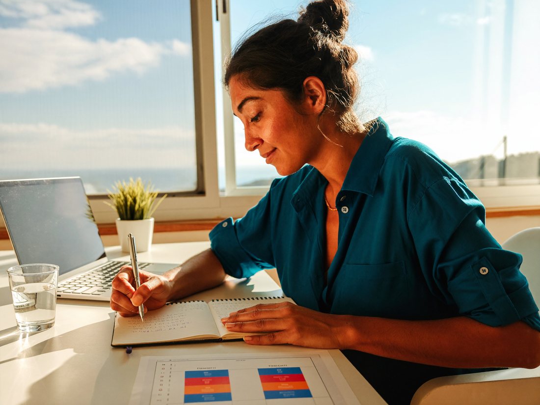 Our nutritionist writing a diet plan